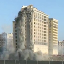 Crews implode historic former hotel in Detroit